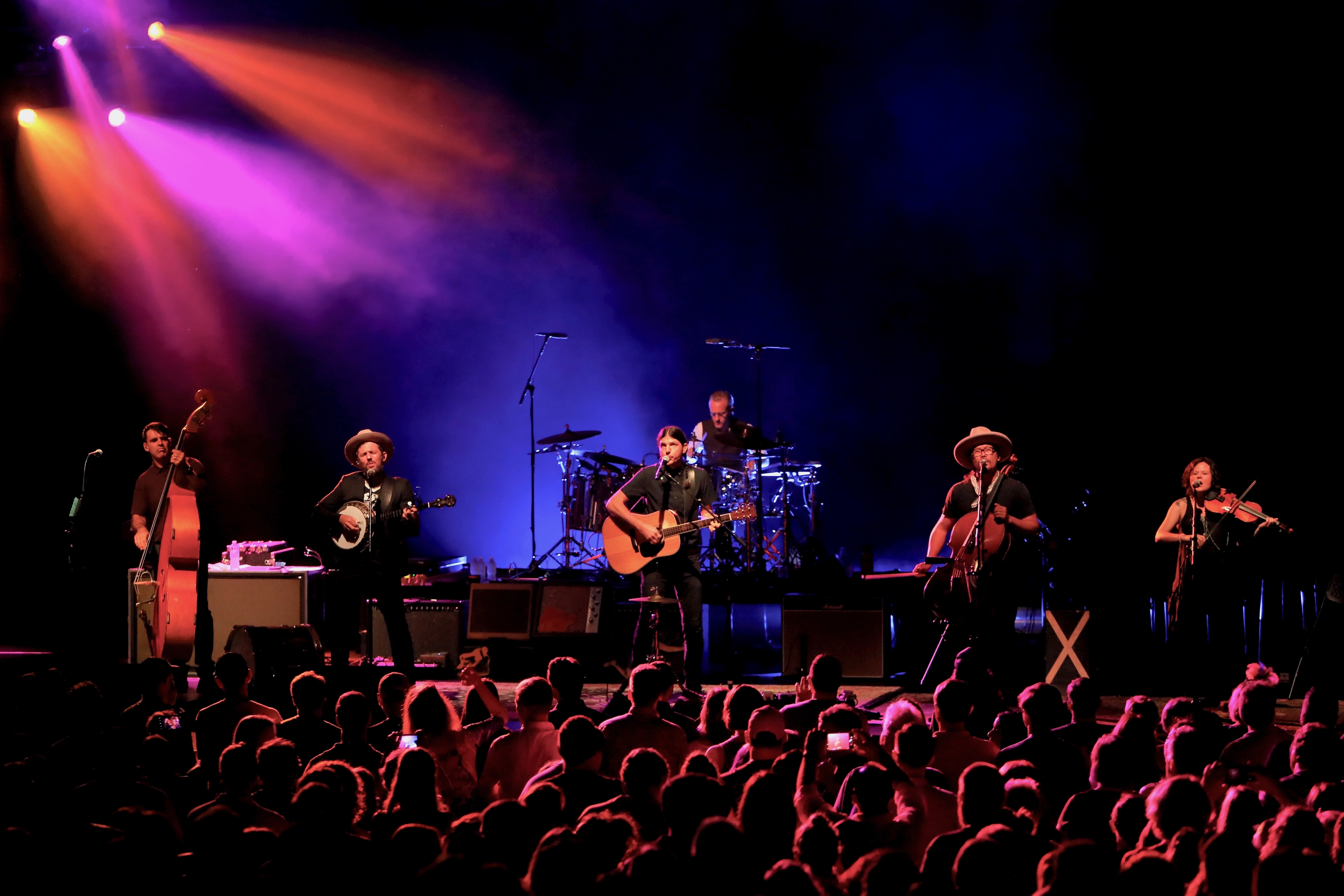 The Avett Brothers performing on tour